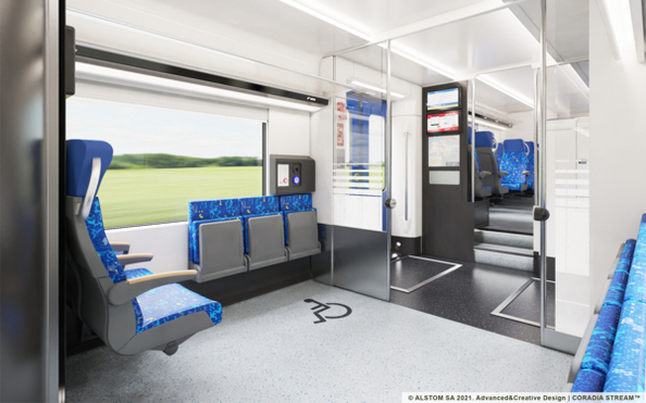 Blick auf Rolliplatz im neuen EBN-Fahrzeug - mit veränderten Klappsitzen und anderer Sprechstelle - unten sowie zu den drei Stufen zum höheren Sitzbereich Blick auf Rolliplatz im neuen EBN-Fahrzeug - mit veränderten Klappsitzen und anderer Sprechstelle - unten sowie zu den drei Stufen zum höheren Sitzbereich